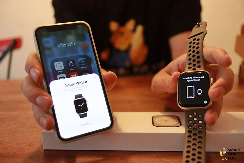 You can see the Apple Watch 8 next to an iPhone.